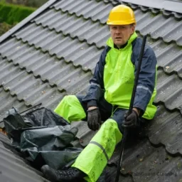 A professional gutter cleaner in Austin, TX, near Pflugerville, equipped with the right tools for expert gutter cleaning. RainShield Experts offers affordable and reliable services, ensuring top-quality